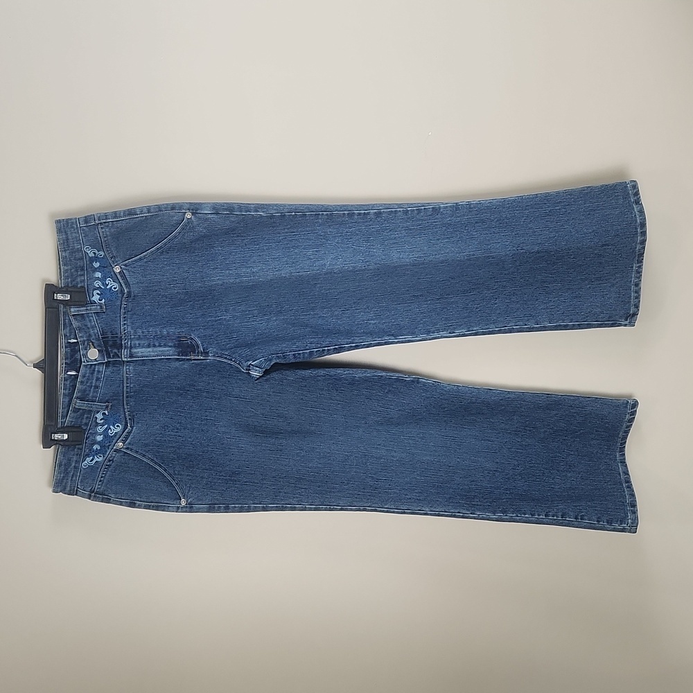 Blue jeans size 12P tag has cut out all the measures in the pictures